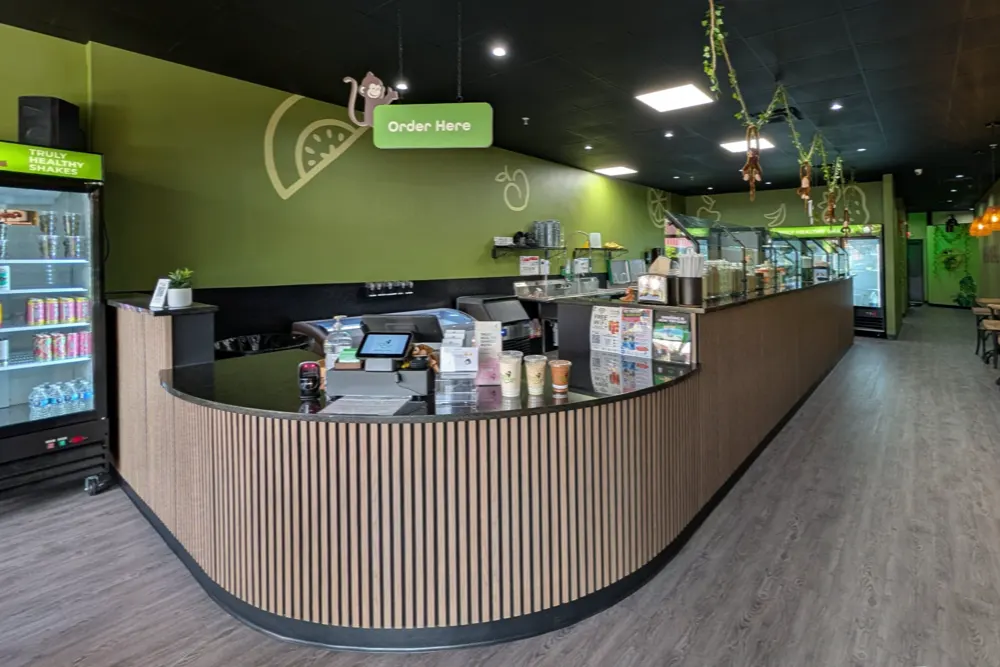 Service counter and finished interior at a Sarasota restaurant buildout