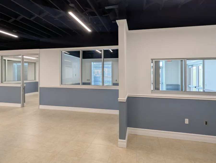 Glass interior windows and private offices in a finished office buildout